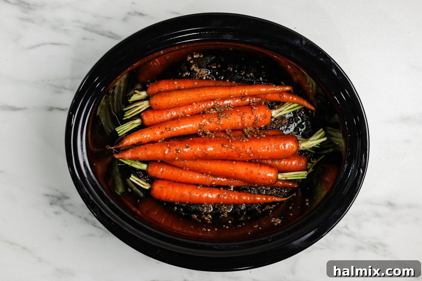 Melt-in-Your-Mouth Balsamic Glazed Carrots 6 Carrots tossed with balsamic glaze, ready for slow cooking