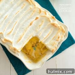 a pan of banana pudding with meringue topping