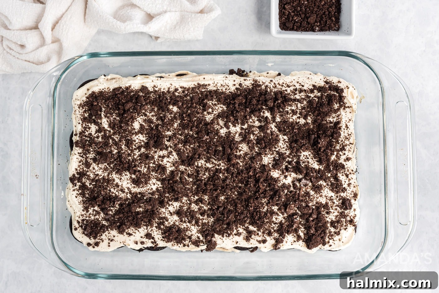 crushed Oreos on top of oreo icebox cake