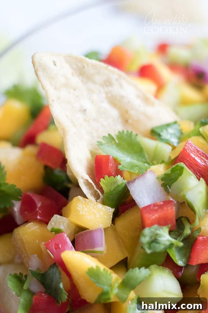 Close up of mango salsa and chips