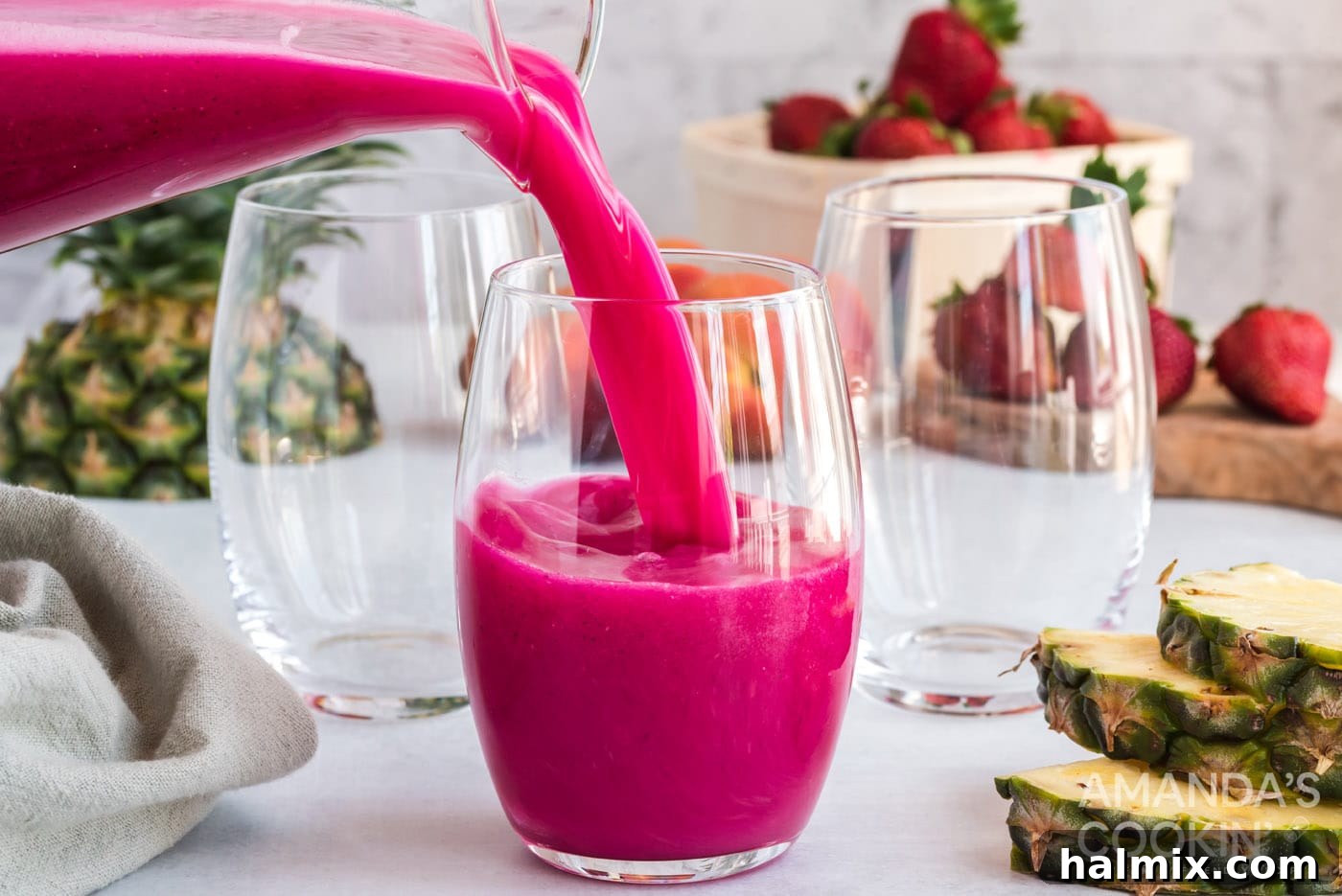 Pouring a perfectly blended, smooth wine slushy into an elegant glass, ready for enjoyment.