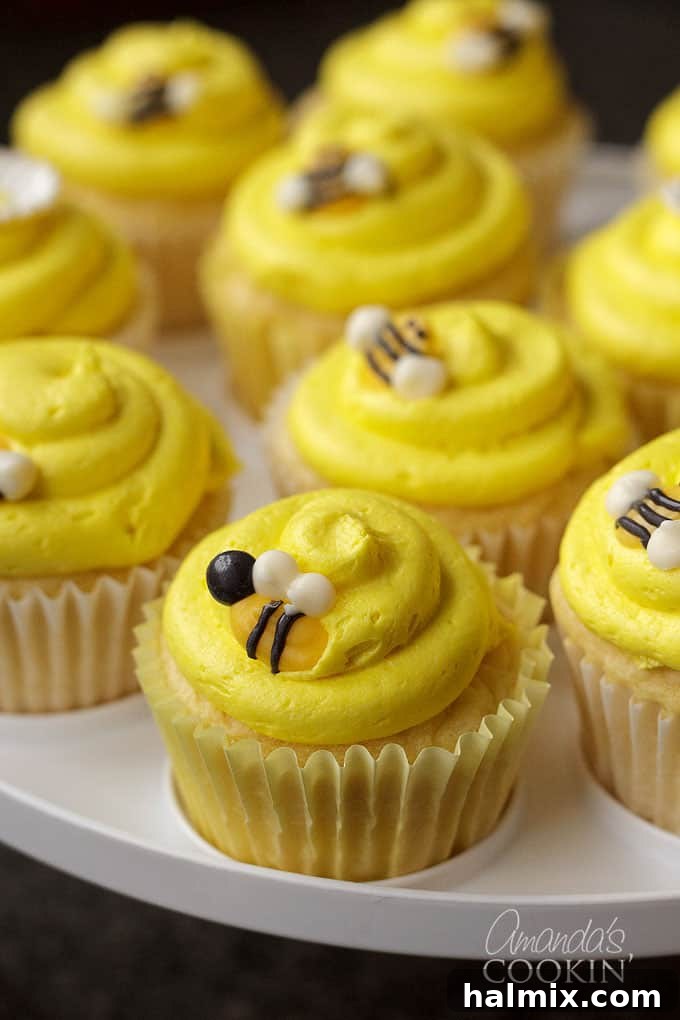 Golden Bee Treat Toppers 2 Close-up of adorable bee cupcakes with homemade toppers