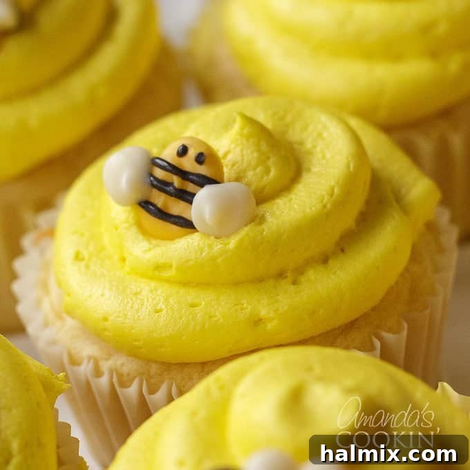 Golden Bee Treat Toppers 10 Close-up of charming bee cupcakes, perfect for a bridal shower