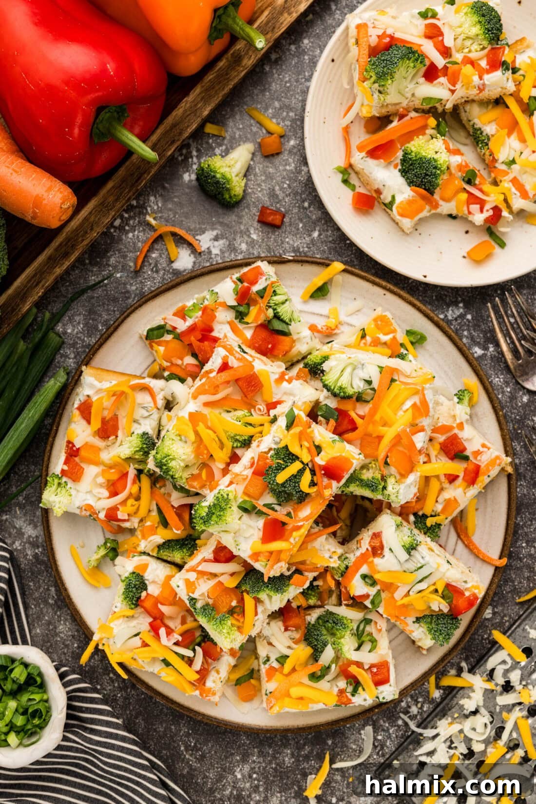 Vibrant Garden Pizza Bites 3 Appetizer Veggie Pizza slices piled on a plate