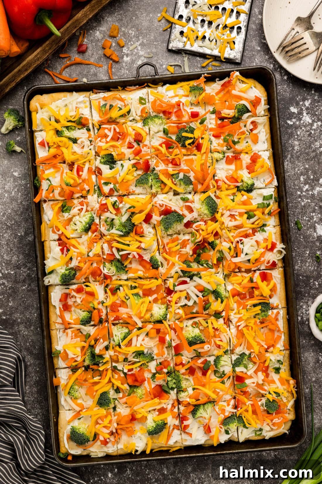 Vibrant Garden Pizza Bites 8 Appetizer Veggie Pizza in a pan cut into slices