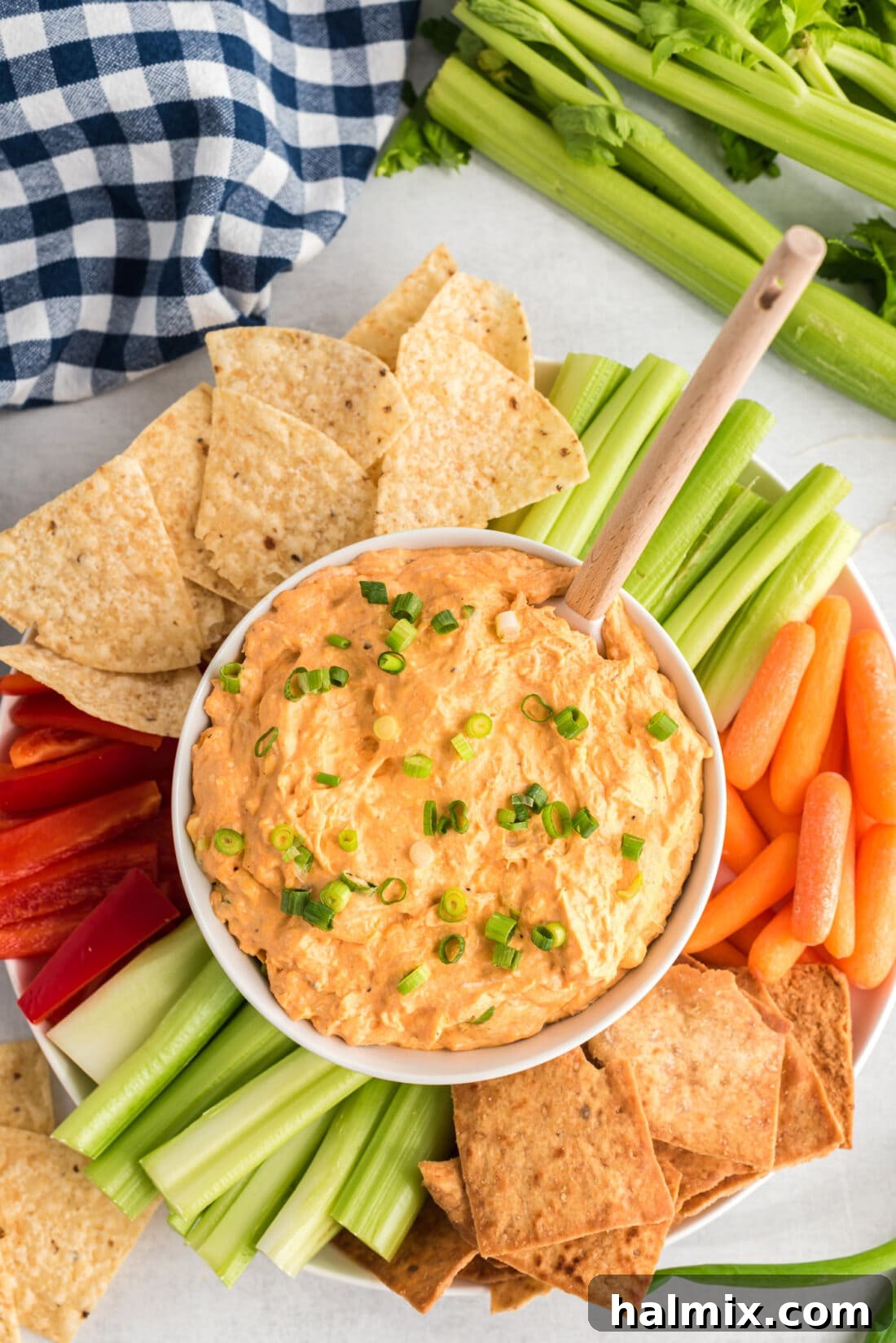 Ultimate Buffalo Chicken Dip 2 Buffalo Chicken Dip in a bowl with chips, ready to be served