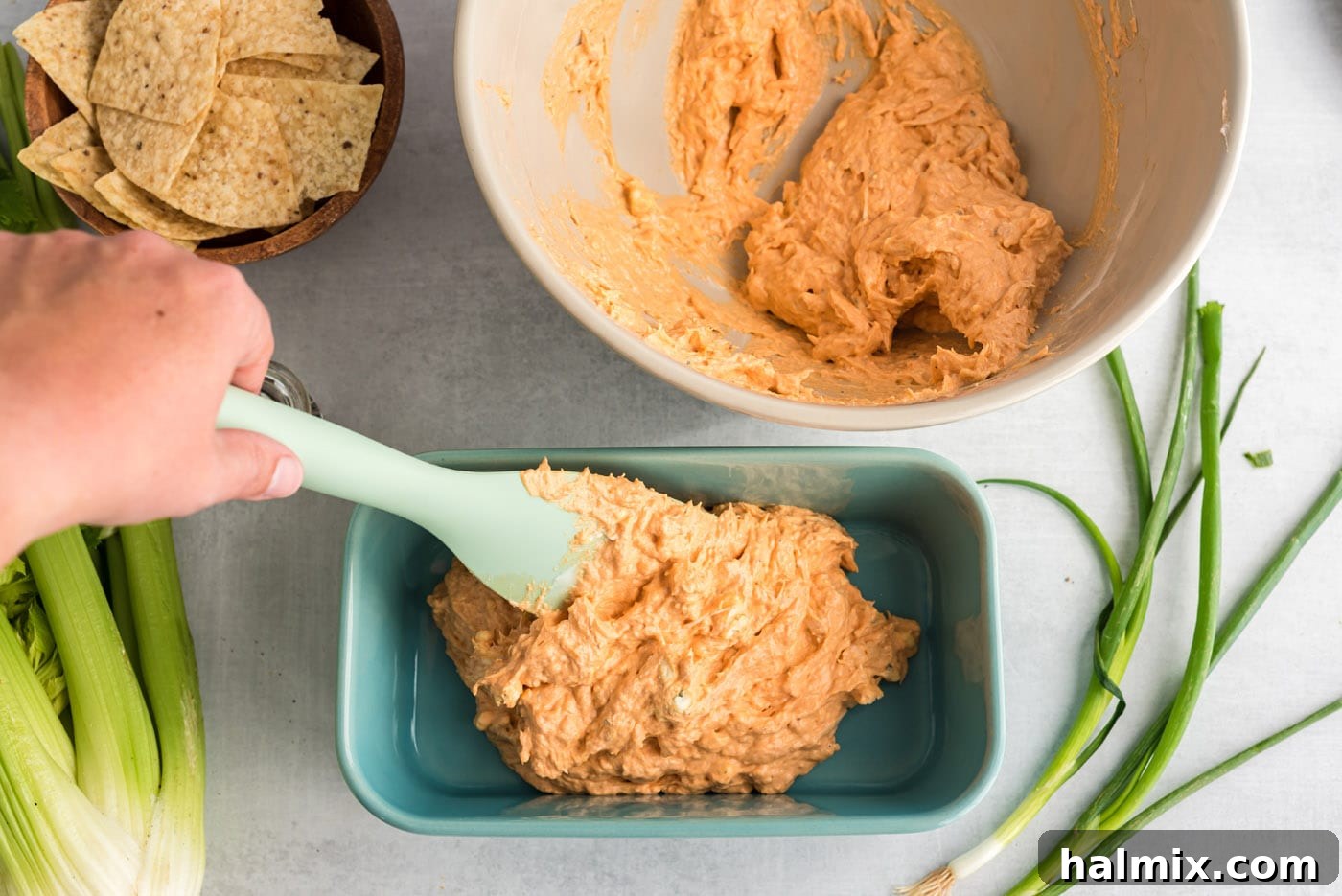 Ultimate Buffalo Chicken Dip 7 Buffalo chicken dip baking in a casserole dish