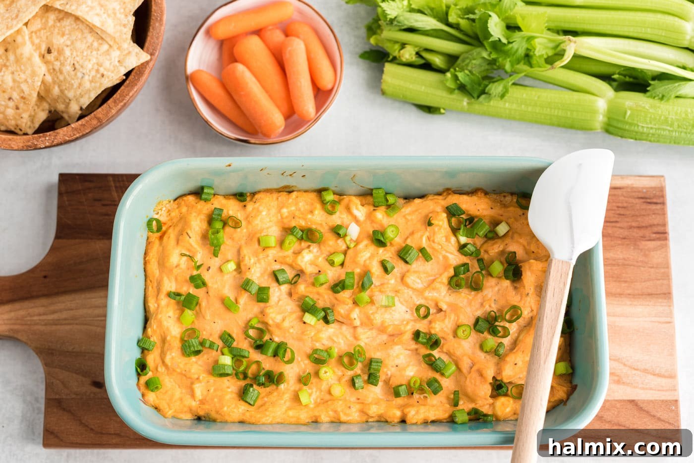 Ultimate Buffalo Chicken Dip 8 Hot and bubbly buffalo chicken dip garnished with chives