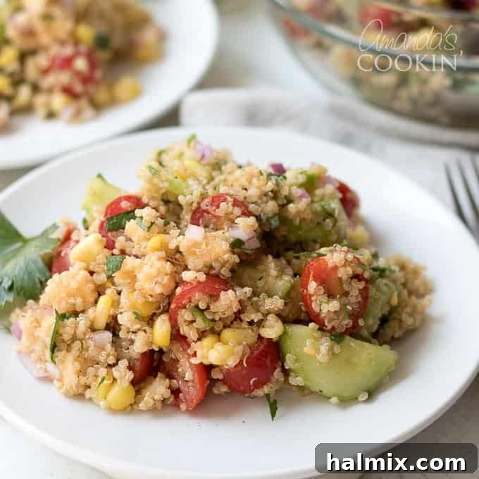 Vibrant Corn and Chickpea Salad 2 Delicious quinoa salad on a white plate