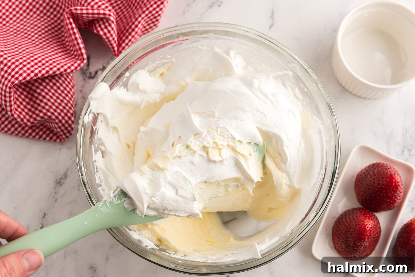 folding cool whip into cream cheese mixture