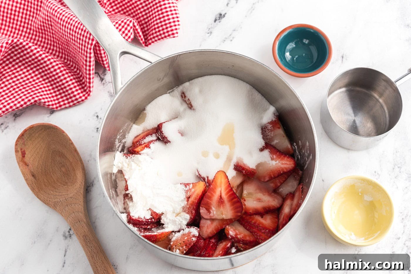 sugar, strawberries, and cornstarch in a saucepan