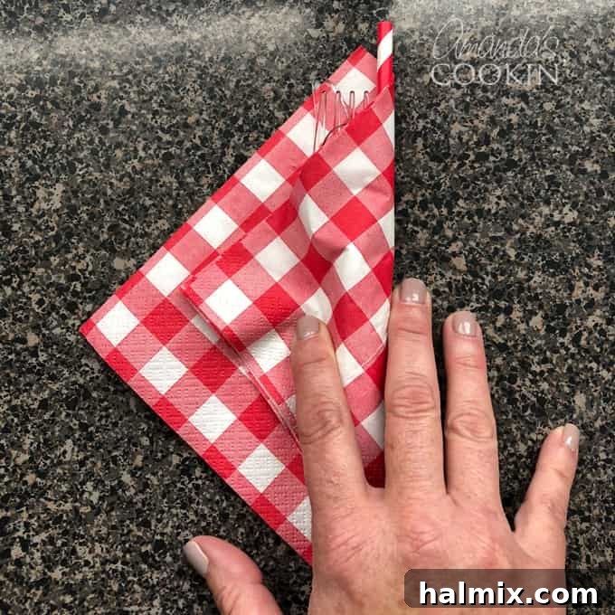 fold napkin over utensils