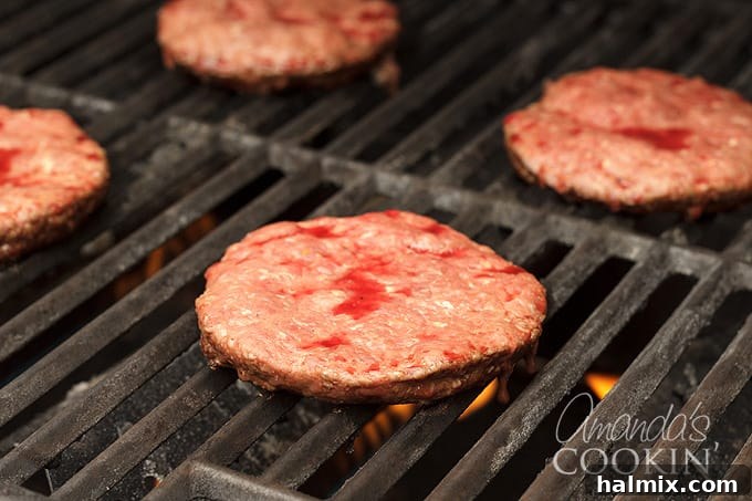 burgers cooking on grill