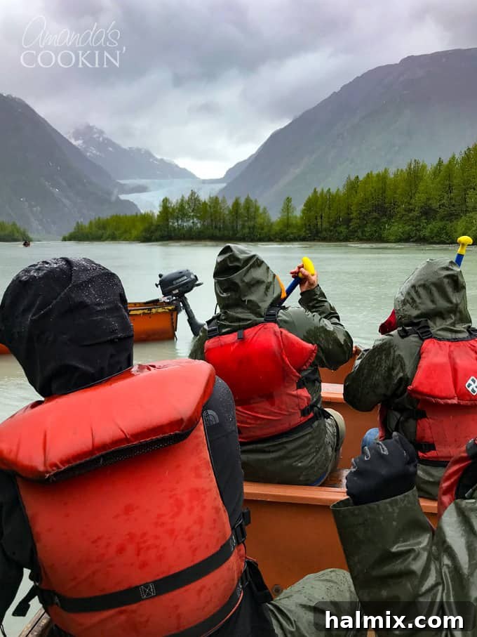 Paddle through serene Alaskan waters on the Davidson Glacier Canoe Tour. A top Skagway excursion for incredible views. #alaskancruise #alaskaexcursion #canoetour #glaciertour #skagwayalaska #visitalaska #travelalaska #sponsored #princesscruises @princesscruises #comebacknew people in canoe in alaska