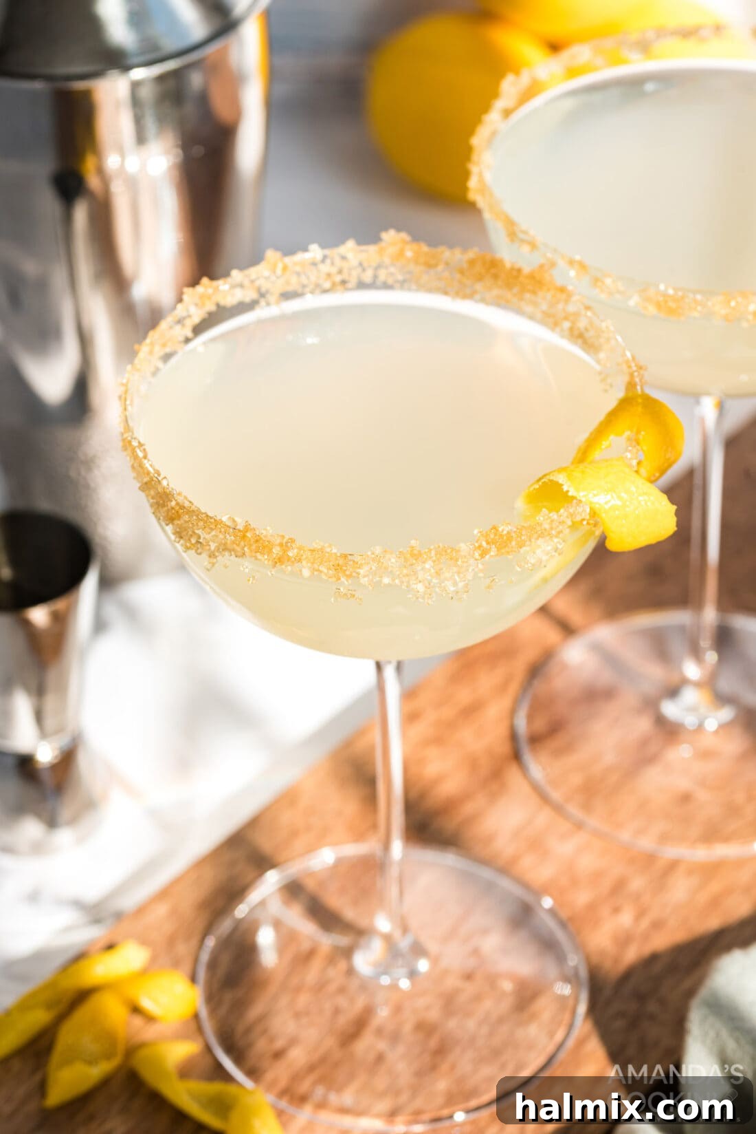 A vibrant Lemon Drop cocktail elegantly displayed in a martini glass, ready for enjoyment.
