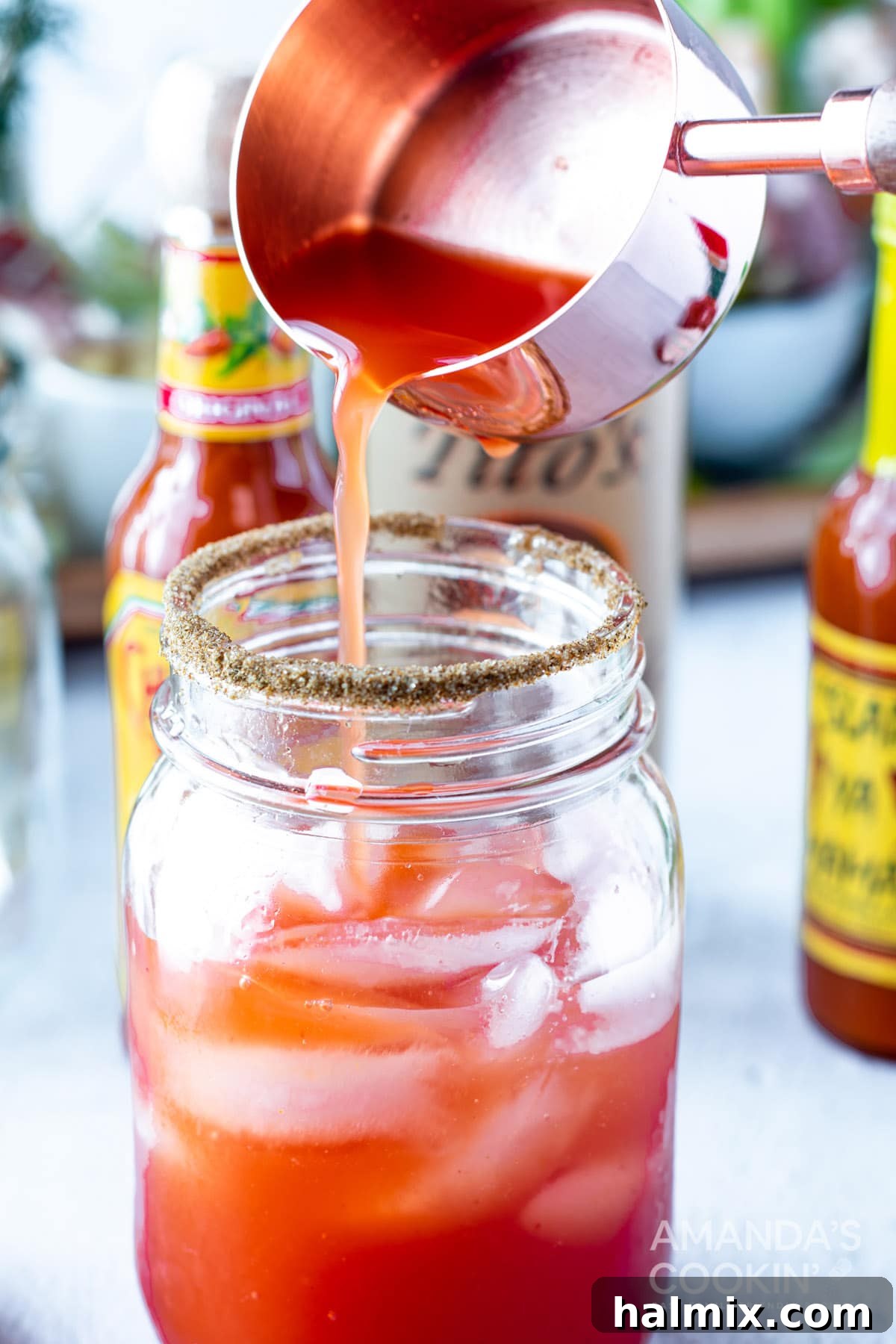 Say Her Name 6 adding tomato juice to jar for Bloody Mary
