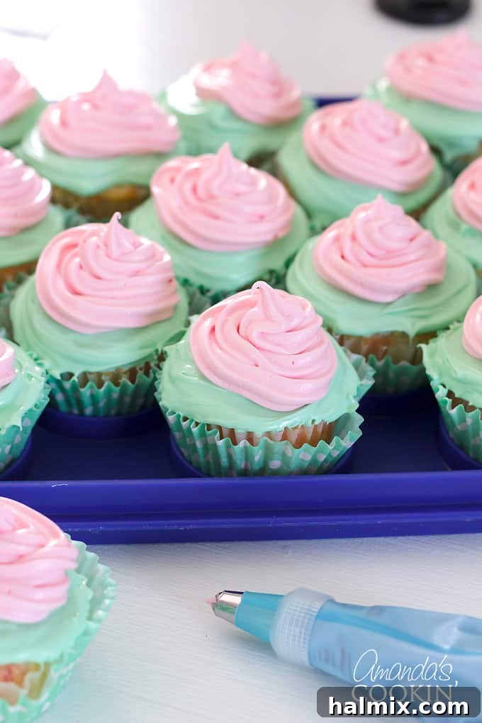 Watermelon Burst Cupcakes 7 Cupcakes with green base and piped pink frosting in the center