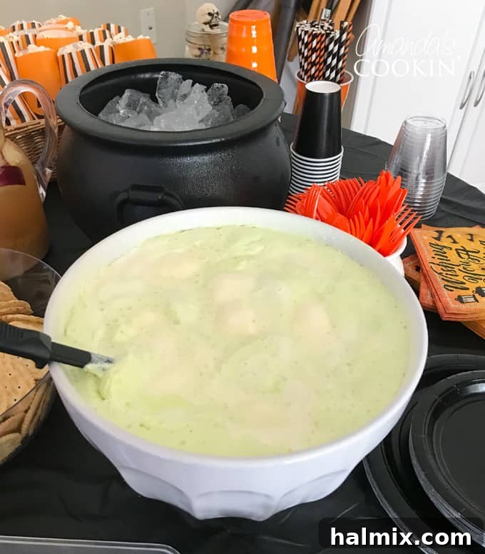 Wicked Halloween Bites 4 Green Halloween punch in a bowl with dry ice effect