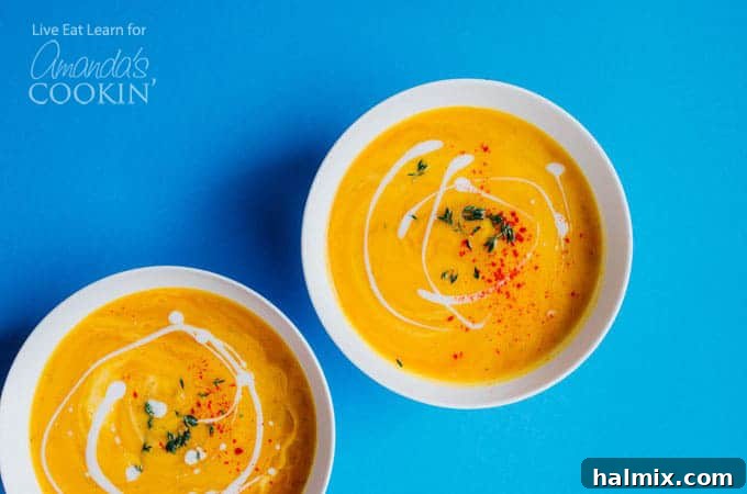 Perfectly Portioned Butternut Squash Soup for a Cozy Meal Two bowls of creamy butternut squash soup, garnished and ready to be enjoyed.