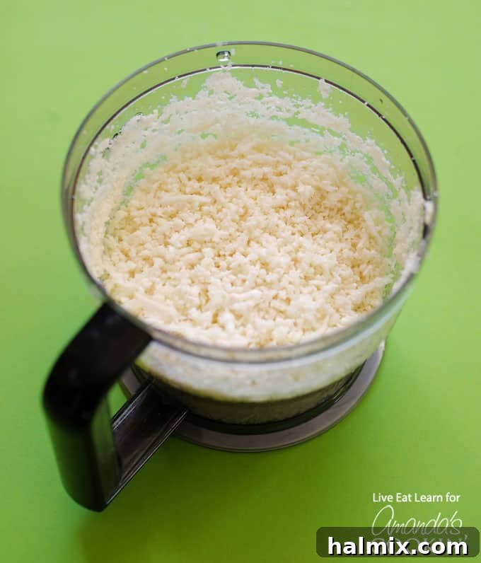 Step-by-step image showing how to make copycat cauliflower chipotle rice in a food processor