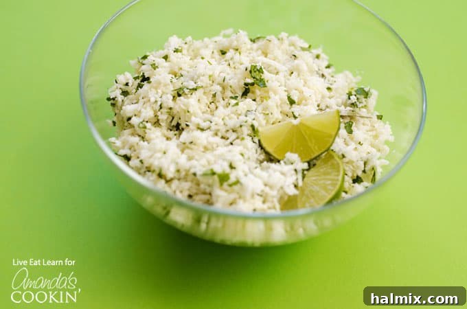Finished Copycat Cauliflower Chipotle Rice in a white bowl, ready to serve