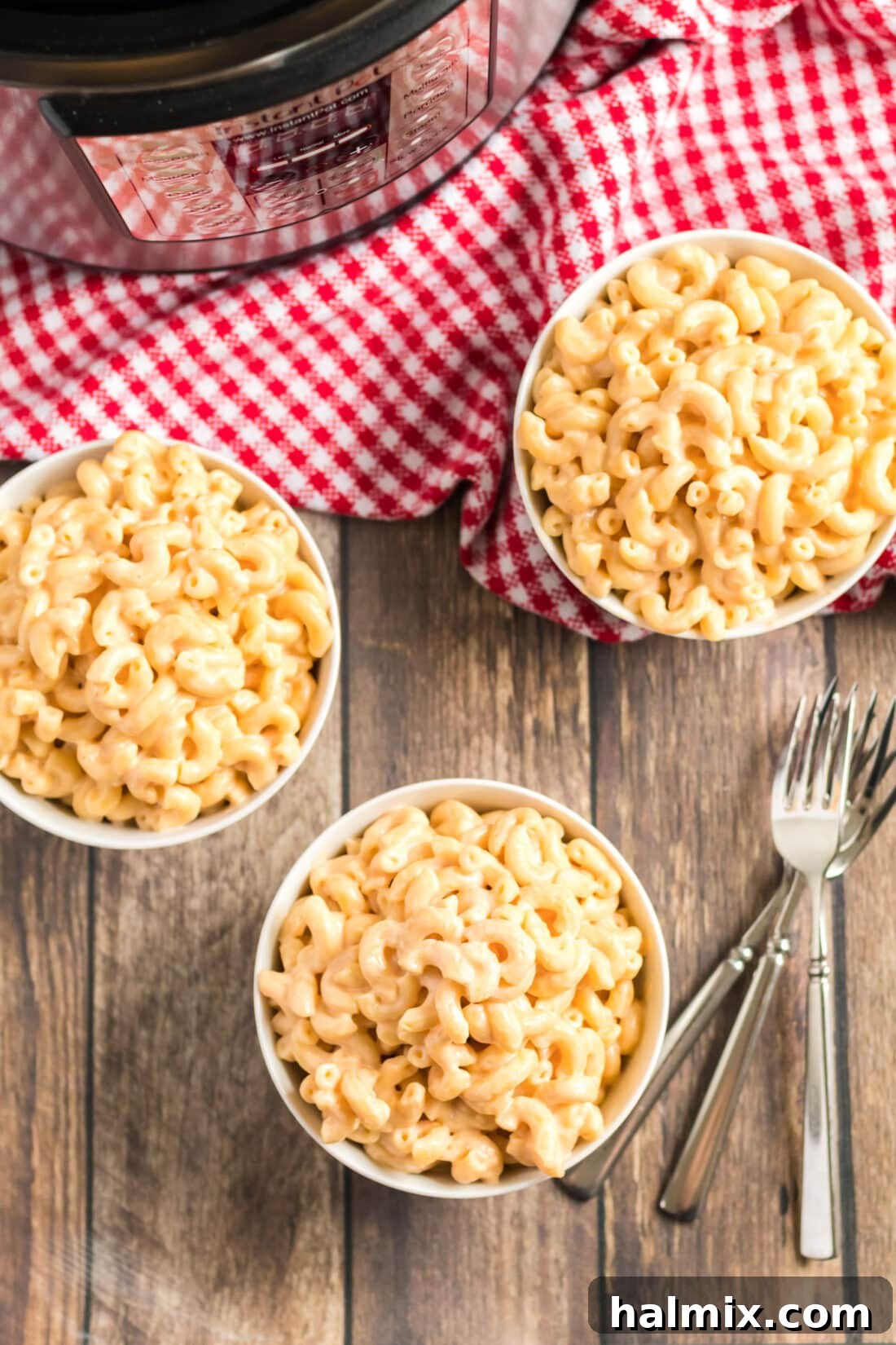 Three bowls of luscious Instant Pot Mac and Cheese ready to be served