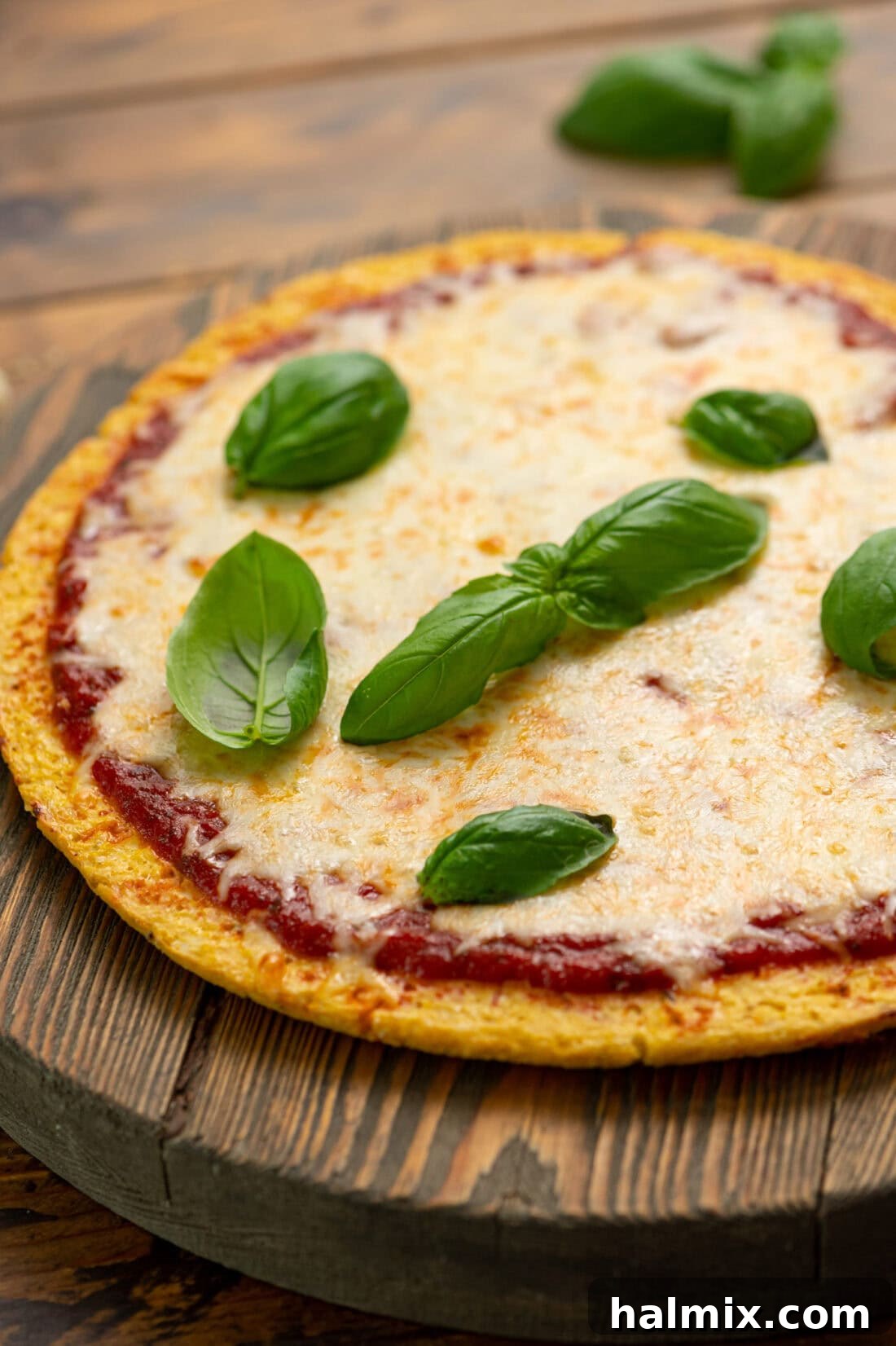 Cauliflower Pizza Perfection 2 Close up photo of a Cauliflower Pizza Crust, perfectly golden and ready for toppings.