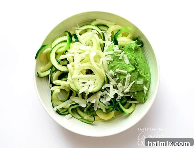 Zucchini noodles are a great low carb alternative to traditional pasta, and they’re so easy to make. Today we will show you how to make them at home! #zucchini #zucchininoodles #lowcarb #keto #lowcarbdinner #dinnerrecipes #vegetarian Zucchini Noodles in bowl