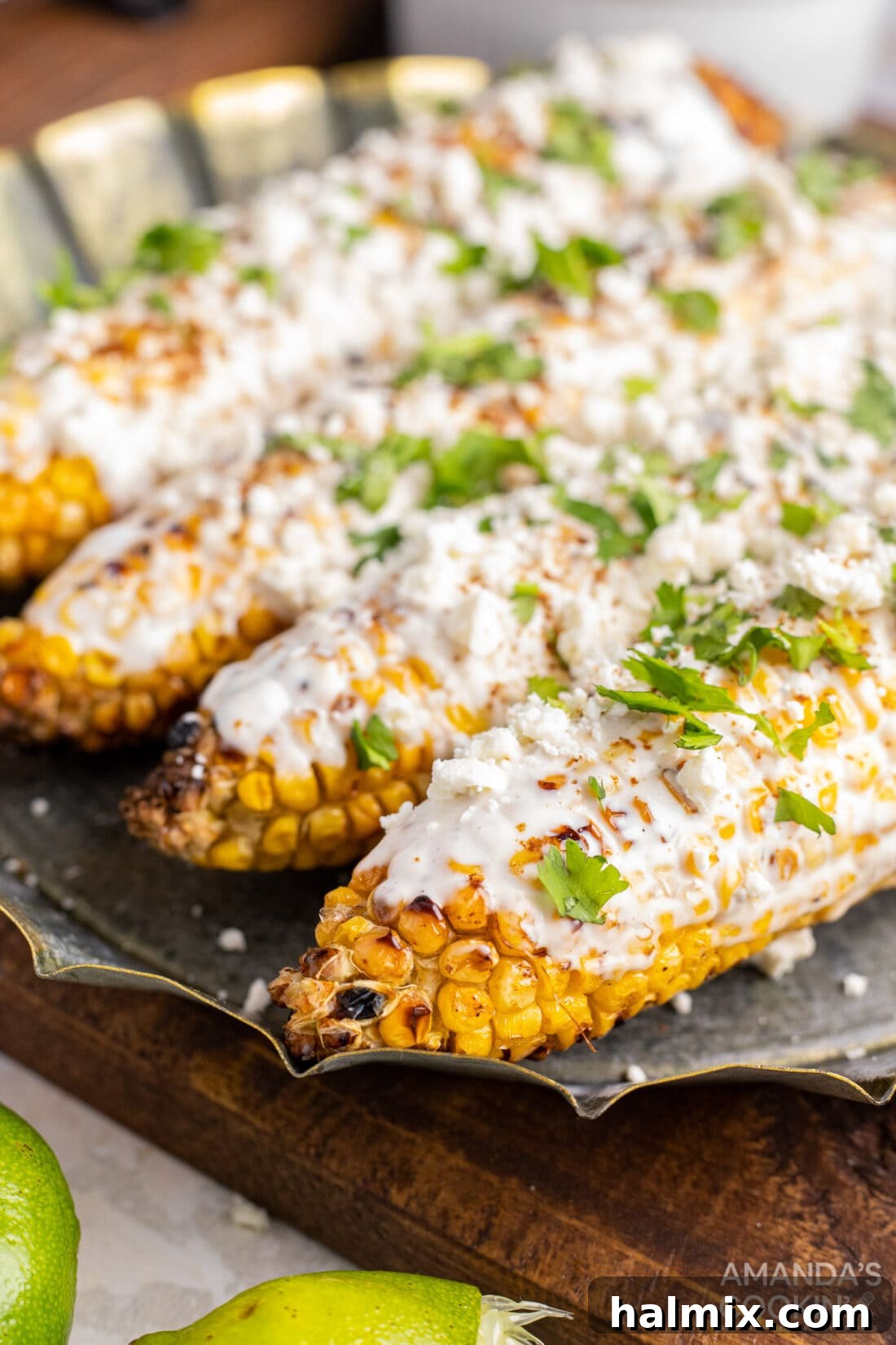 Mexican Street Corn Fiesta 6 Fully dressed Mexican corn on the cob, ready to be served.