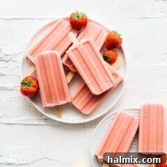 strawberry popsicles on a plate