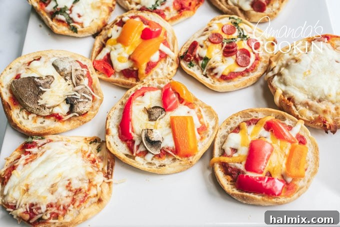 A selection of various English muffin pizzas with different toppings, showcasing their customization potential