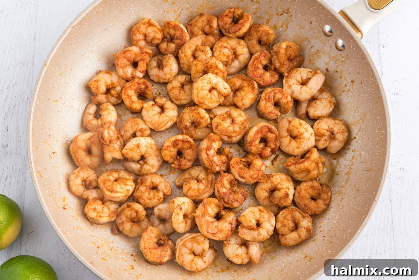 Coastal Shrimp Tacos 6 cooked seasoned shrimp in a skillet