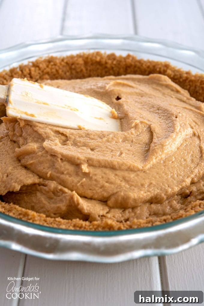 spread peanut butter mixture onto crust