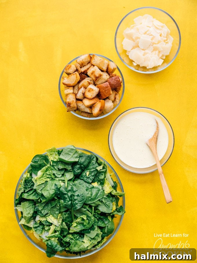 Freshly cut bread cubes and garlic cloves, ready to be transformed into homemade croutons