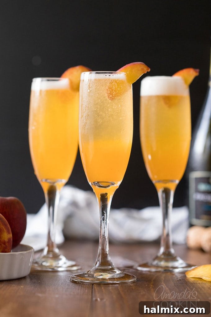 Two elegant Bellini cocktails, perfectly crafted and served in crystal champagne flutes, garnished with fresh peach slices