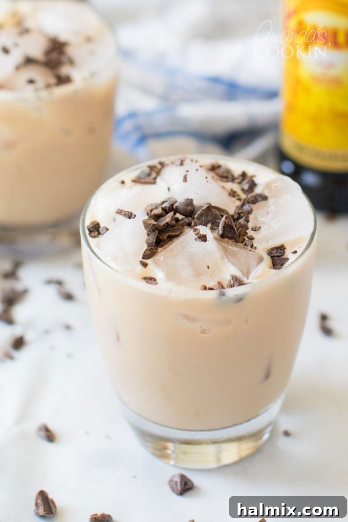 Flowing Devastation 2 Classic Mudslide cocktail served on the rocks with chocolate shavings on top, in a rock glass