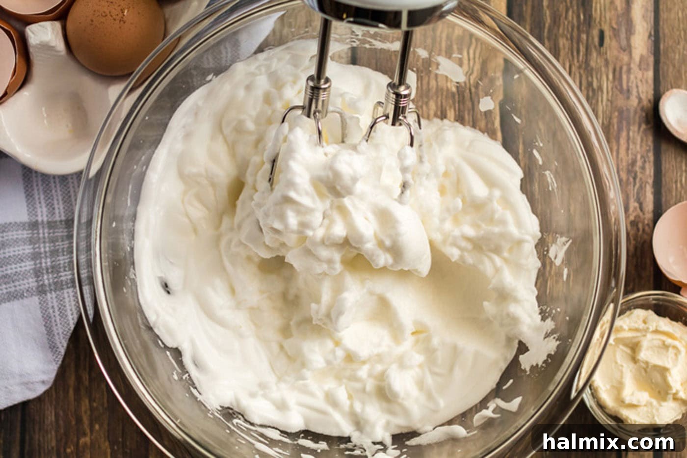 Pillowy Cloud Bread 5 Egg whites and cream of tartar expertly whipped to stiff peaks, indicating perfect aeration