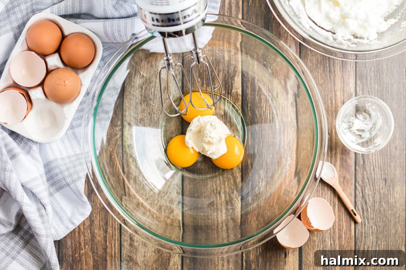 Pillowy Cloud Bread 6 Cream cheese and egg yolks combined in a bowl, ready to be mixed for the cloud bread batter