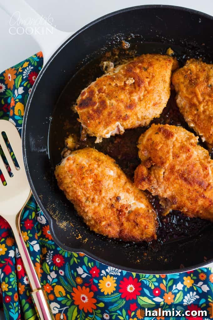 Oven fried chicken in a skillet
