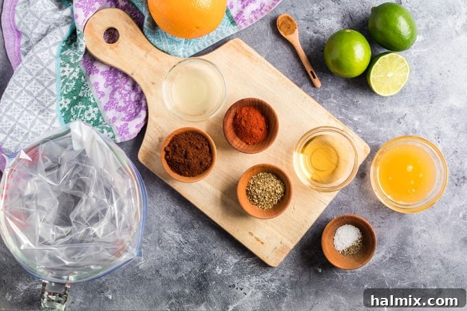 An organized display of fresh ingredients for chicken tacos laid out on a wooden cutting board, including marinated chicken, tortillas, and various toppings.
