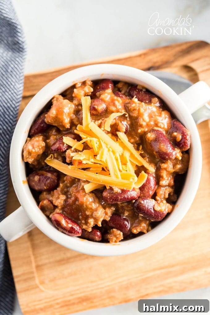 overhead view of homemade chili in a white bowl