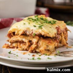 Close up photo of a serving of Italian Lasagna on a plate
