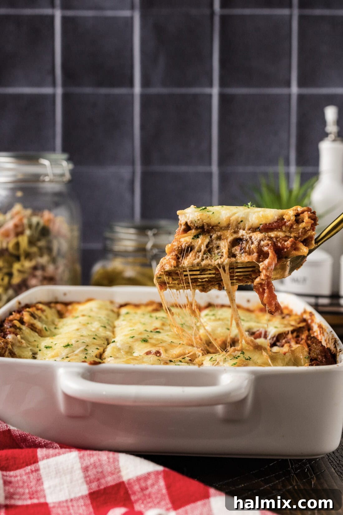 Classic Italian Lasagna 4 Spatula lifting up a piece of Italian Lasagna from the pan