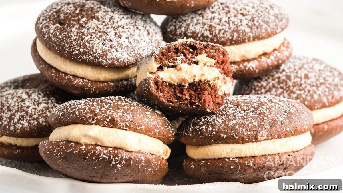 A beautiful arrangement of mini pumpkin whoopie pies in a gift-ready presentation, perfect for sharing autumn joy.