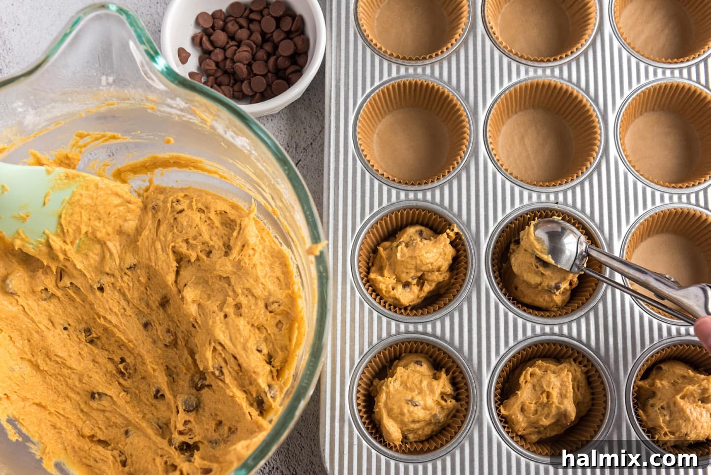Harvest Pumpkin Chocolate Chip Muffins 16 scooping pumpkin muffin dough into pan