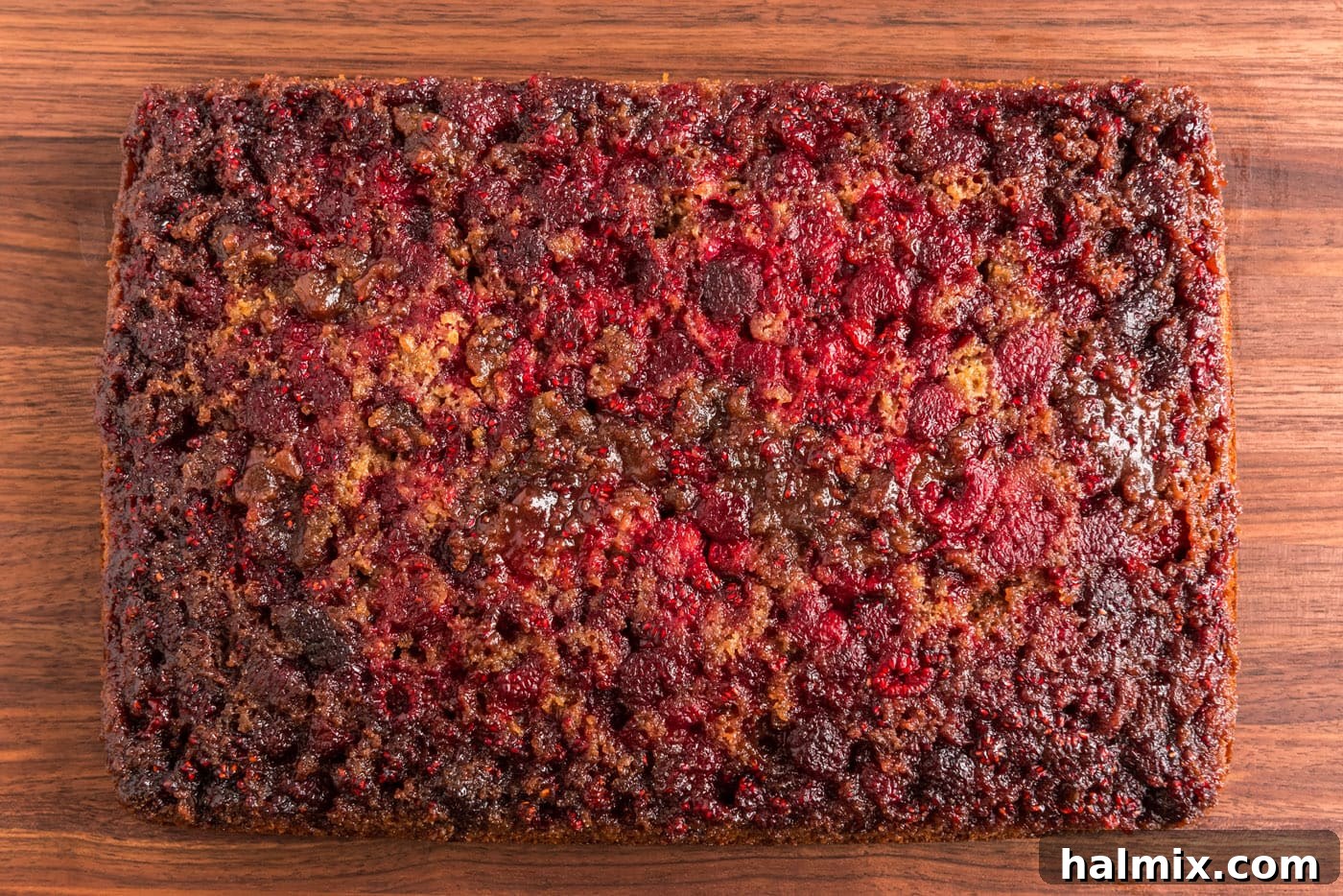 Crimson Raspberry Flip 13 Freshly flipped raspberry upside down cake, revealing the beautiful berry topping