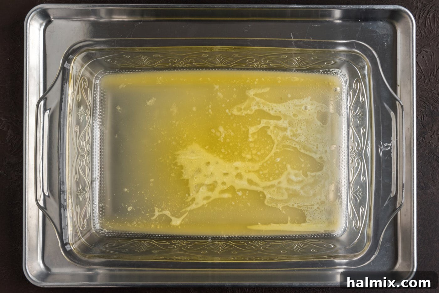 Crimson Raspberry Flip 8 Melted butter pooled evenly in the bottom of the baking dish