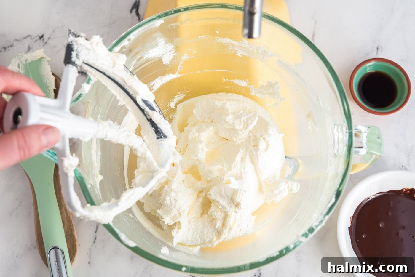 Decadent French Silk Delight 8 Creamed butter and sugar in a stand mixer bowl, looking light and fluffy after being beaten.