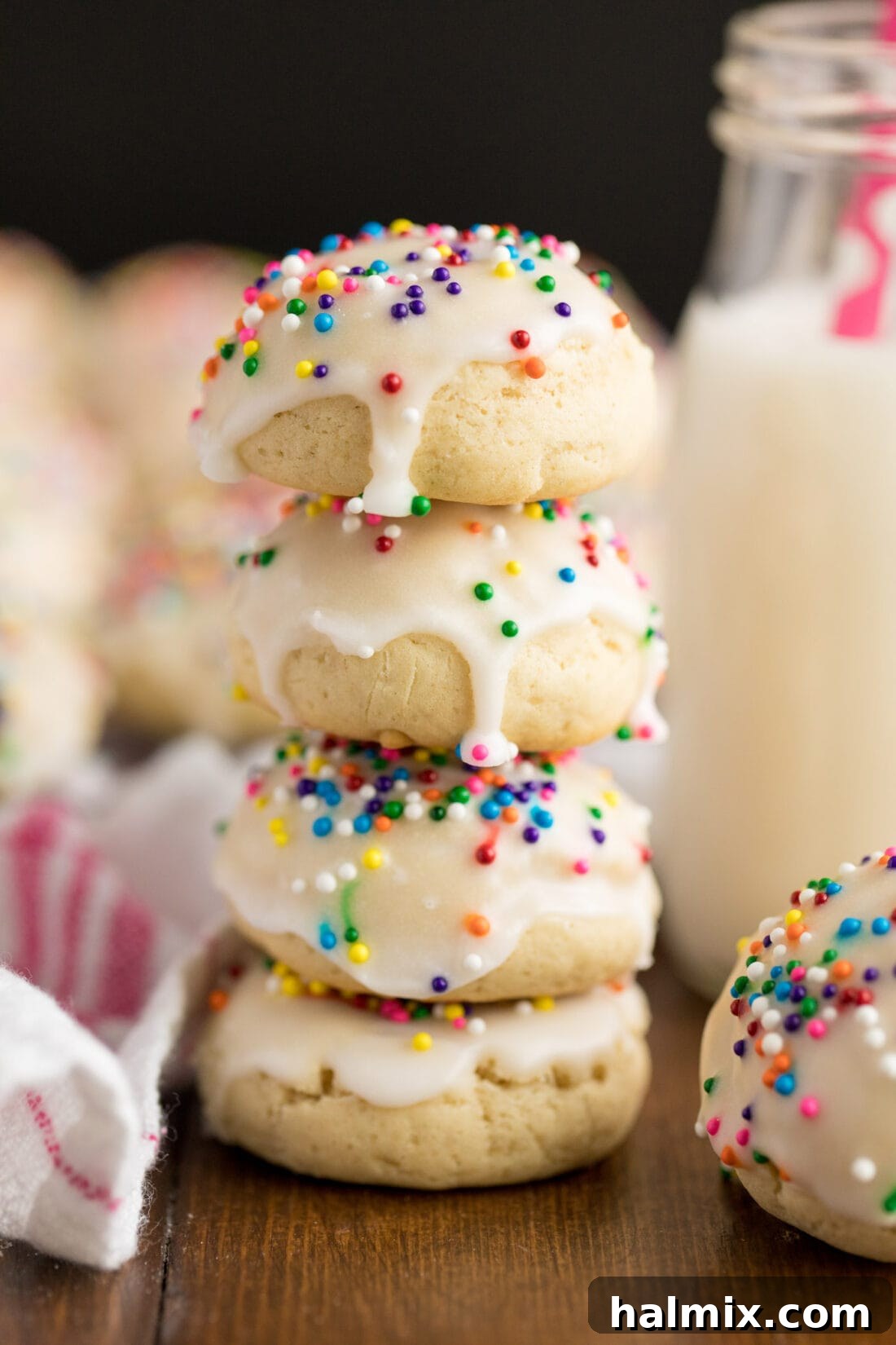 A beautifully arranged stack of glazed anise cookies, showcasing their inviting texture and festive appearance.