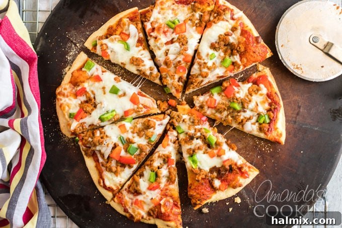 Perfect Homemade Pizza Crust 14 freshly sliced homemade pizza